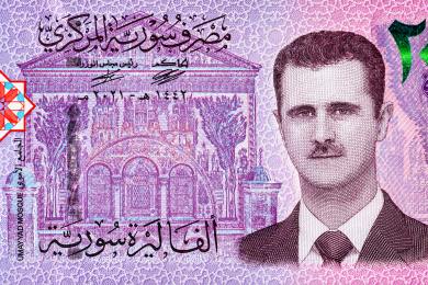 Sýrie zavádí nové bankovky, Asadovu podobiznu nahradí olivy a růže
