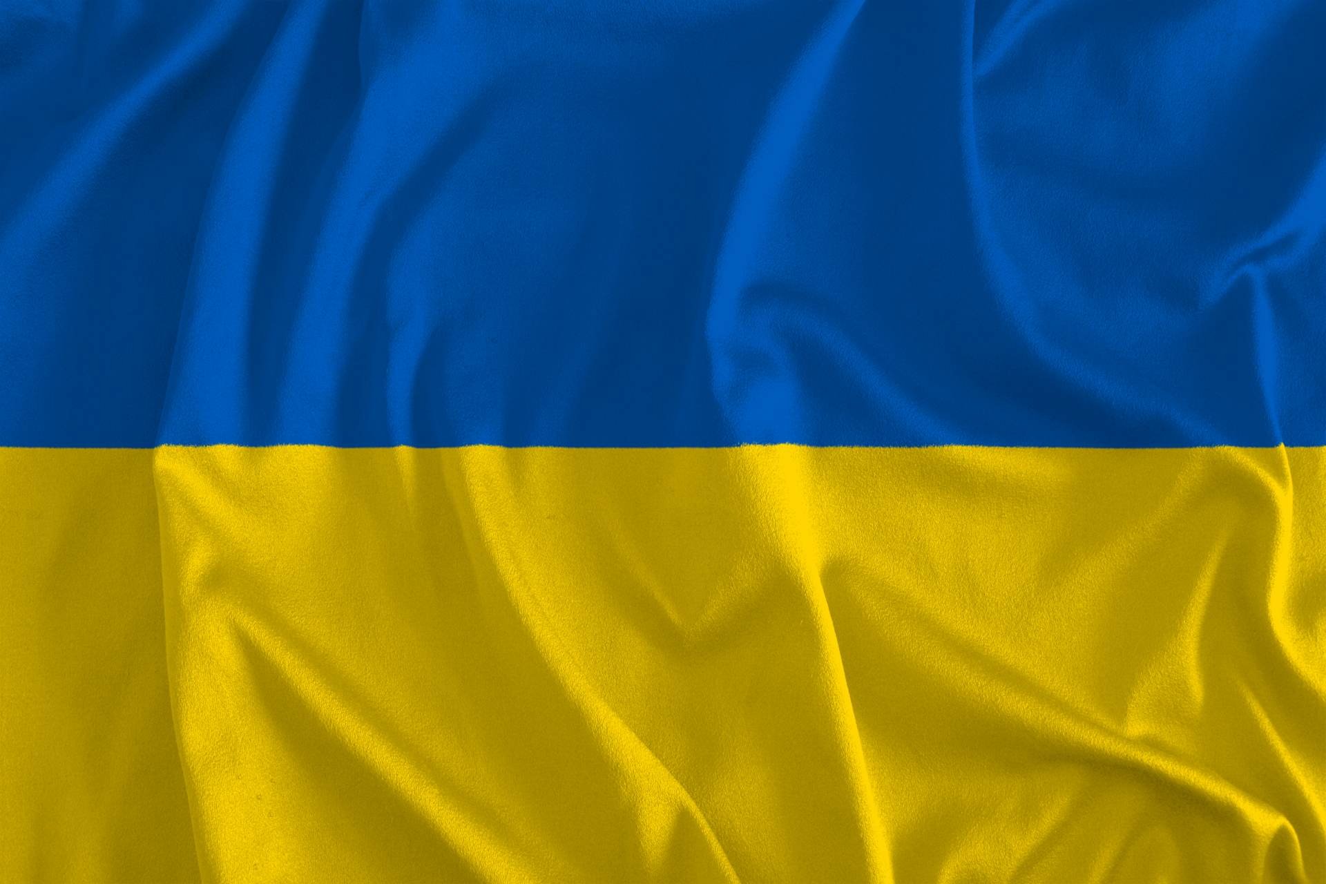 Demonstranti symbolicky vrátili vlajku Ukrajiny na budovu Národního muzea